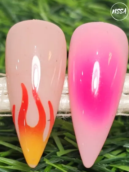A showcase of two popular hand-painted effects. On the left, a fiery flame design, and on the right, a soft airbrushed-style ombre, both created with gel polish and a steady hand.
