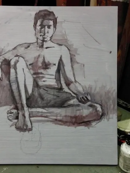 The initial underpainting or drawing for the figure study. This monochrome layer helps establish the values and composition.