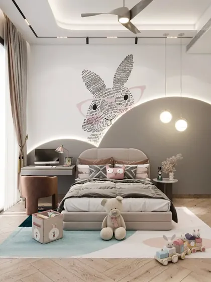 A render of a little girl's room featuring a playful bunny mural and a curved, illuminated headboard. The design uses soft pastel colors and storybook-inspired shapes to create a whimsical and dreamy atmosphere.