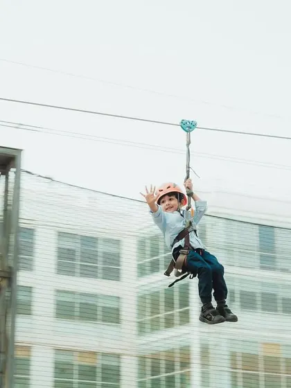 Adventure is calling! I love setting up thrilling activities like this zip line at community fiestas. It’s a safe and super exciting experience that gives kids a rush and parents a great photo opportunity.