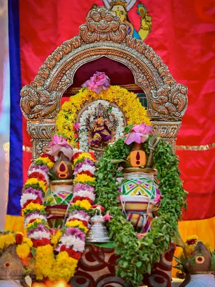 The altar for the Maha Sudarshan Homa, beautifully decorated with flowers and sacred objects. The care taken in preparation reflects our deep reverence.