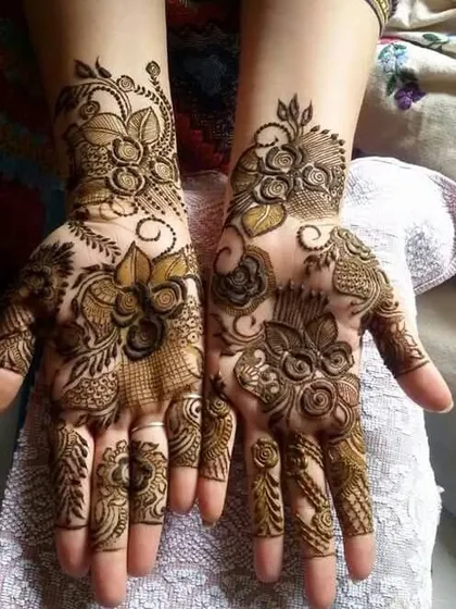 A close-up of two different intricate designs, showing the variety in my floral and filler work.