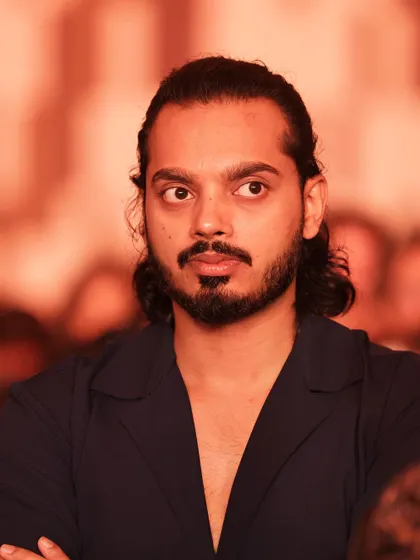 A candid moment of focus during one of the talks at our office event. I'm always listening and learning from my peers and mentors.