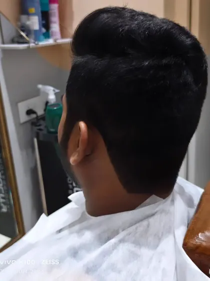 The back view of this expertly crafted men's haircut.