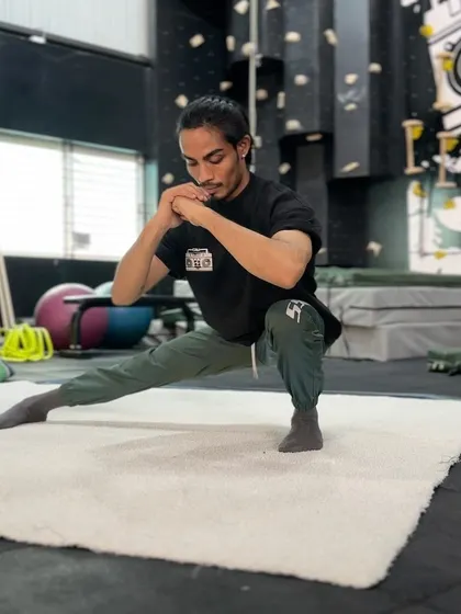 The Cossack squat is another essential mobility drill we teach. It improves hip, knee, and ankle flexibility all at once.