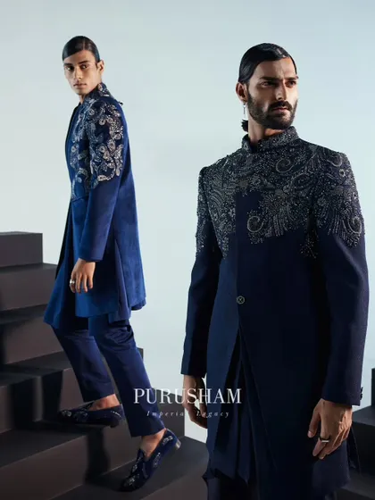 Another view of my regal blue jackets. The contrast between the two embroidery styles shows how I can create a unified yet distinct look for a groom and his party.