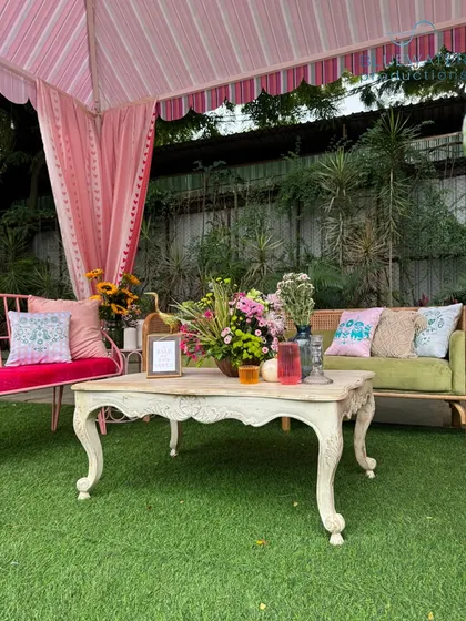 The pink gazebo lounge, with its mix of comfortable sofas and chairs.
