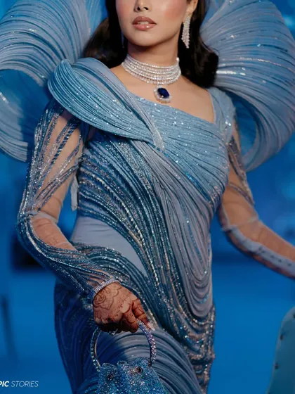 A close-up detail of Darin's incredible Gaurav Gupta gown. The intricate textures, the flowing lines, and the stunning jewelry all come together in this high-fashion bridal shot from her Dhaka wedding.