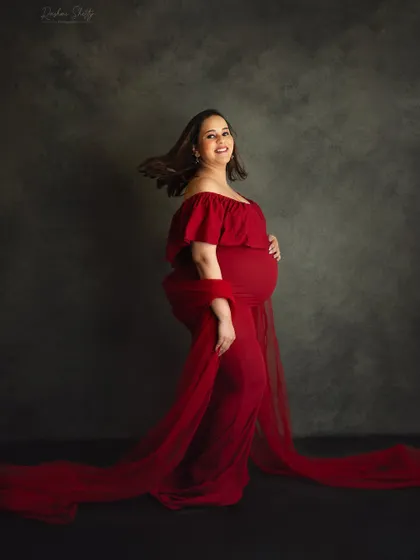 A simple hair flip can add so much life and energy to a photo. This shot captures a moment of joy and confidence, showcasing the beautiful movement of the gown.