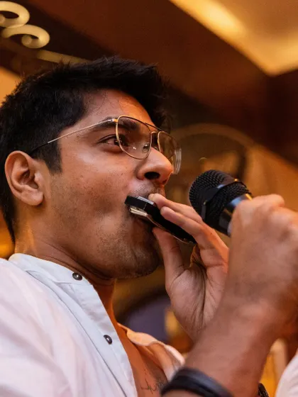 This guest brought a harmonica to his performance. I love it when people bring their unique talents to the stage.