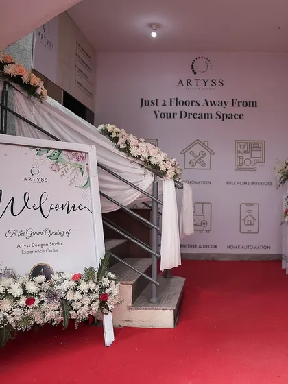 The entrance staircase at our launch event, decorated to welcome our guests. The sign says it all: "Just 2 Floors Away From Your Dream Space."