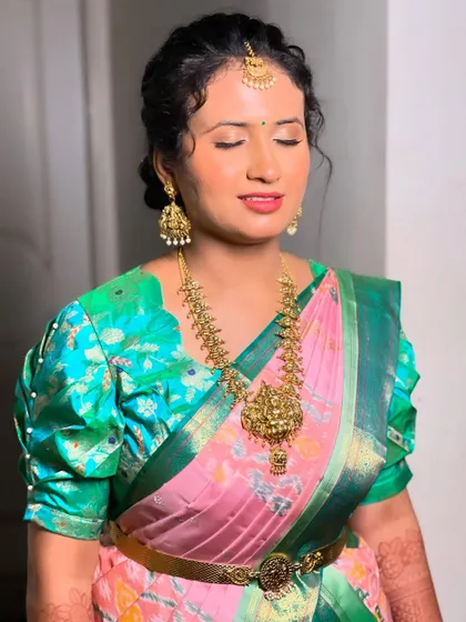 A shot with eyes closed to show the soft, shimmery eyeshadow.