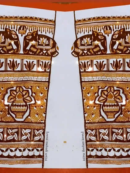 A full-arm practice design featuring elephants and a central kalash motif.