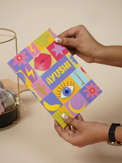 This quirky and colorful personalized notebook is another fun item I included in Ayushi's birthday hamper.