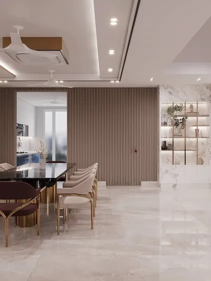 This image demonstrates the impact of furniture on a large, open space. The 8-seater dining table with its black marble top and gold-accented chairs fills the area, creating a defined and grand dining zone.