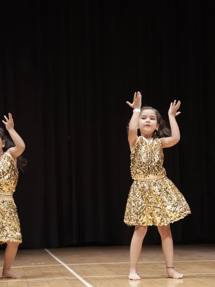 Two of our 'Little Champs' performing in perfect sync. Teamwork makes the dream work!
