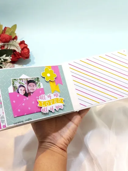A cute page from the scrapbook with a mini envelope to hold a small photo or note.