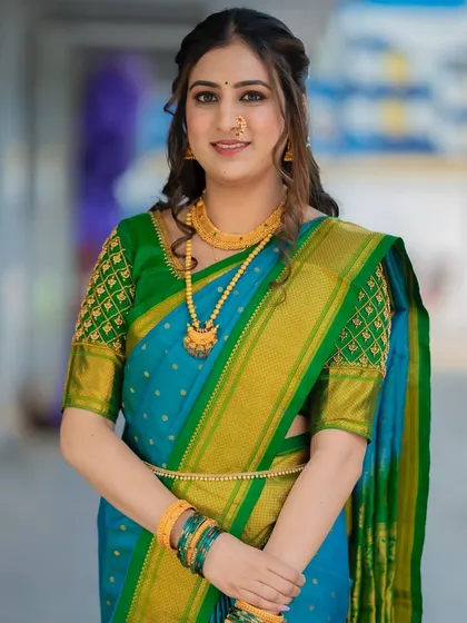The full look, showcasing the elegant saree and the minimal, glowing makeup. A perfect style for a modern bride.