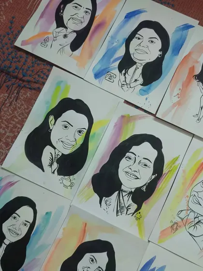 Another angle on the collection of watercolor and ink caricatures.