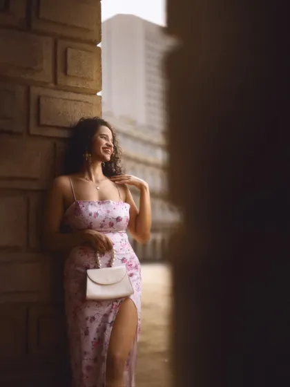 Using the city's architecture to frame a portrait. I love finding interesting angles and pockets of light to create a dreamy, editorial look even in an urban setting.