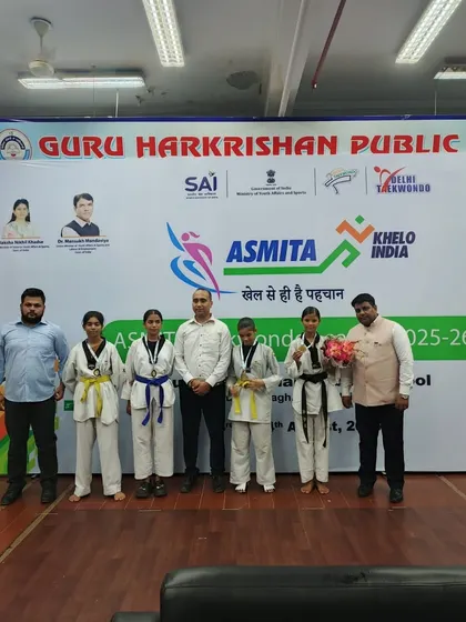 My students and I at the ASMITA Khelo India Taekwondo event. It is always rewarding to see them recognized for their skills.