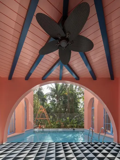 An arch frames a view, creating a deliberate moment of focus. Here at Baia Villas, the archway over the pool frames the lush tropical landscape, creating a living painting and a tranquil space for reflection.