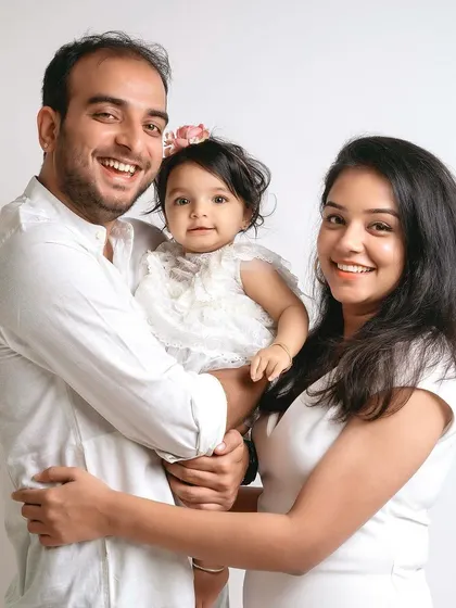 A joyful family photo that perfectly captures their love and happiness.