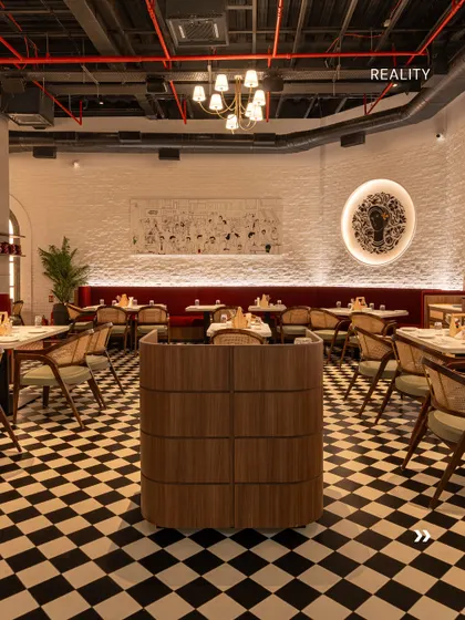 The final photo of the Fountain Sizzlers dining area. The executed space is a near-perfect match to our render, delivering on the promise of a warm, inviting, and art-filled restaurant.