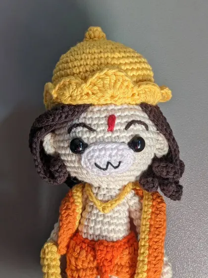 A straight-on portrait of the Lord Hanuman doll.