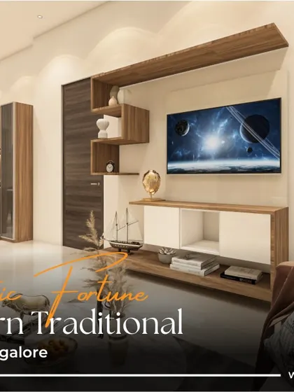 The 'Majestic Fortune' 3BHK in Bangalore is a perfect example of modern traditional design. The TV unit combines sleek white surfaces with warm wood tones, creating a balanced and stylish focal point.