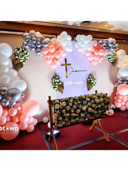 A wide shot of the Baptism party stage.