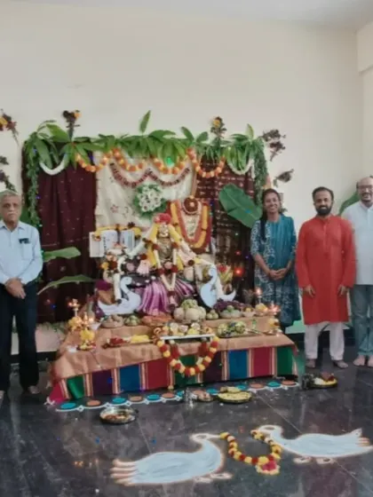 A group photo with the students and teachers, marking the successful completion of another yoga course for children in the community.