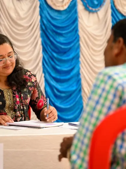 A doctor from my team providing a one-on-one consultation during our free health camp. We believe in attentive listening and personalized advice for every individual.
