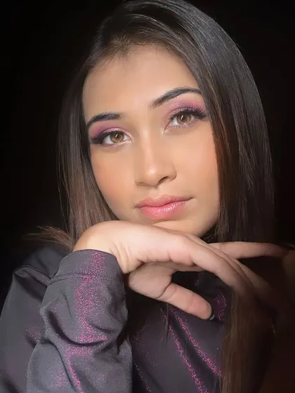 A simple, elegant portrait that lets the eye makeup shine.