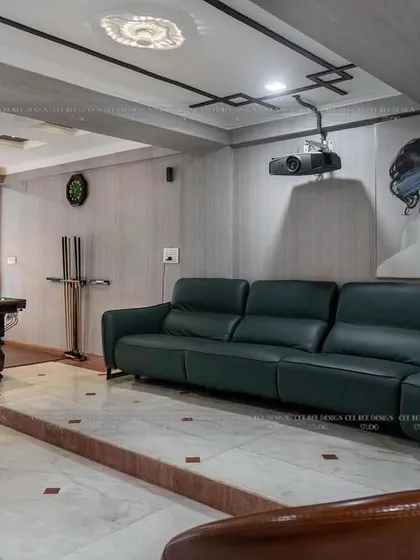 Another view of the entertainment room from image 152, showing the projector setup and overall layout.