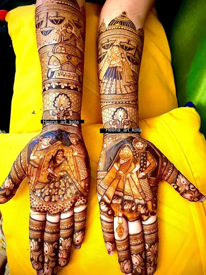 A full bridal design with multiple stories, including couple portraits and doli scenes, all in one intricate piece.