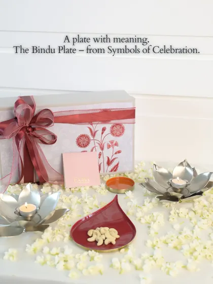 This is the Bindu Plate, from our Symbols of Celebration collection. We shaped this simple dot, a symbol of beginnings and unity, into an elegant plate for your mithai and those little festive moments that matter most.