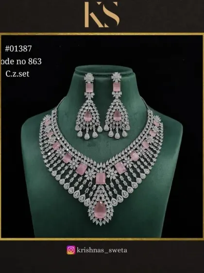 A soft pink version of our C.Z. set, perfect for a romantic look.