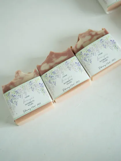 A trio of the lavender and sage-themed soaps, wrapped and ready for a baby shower.