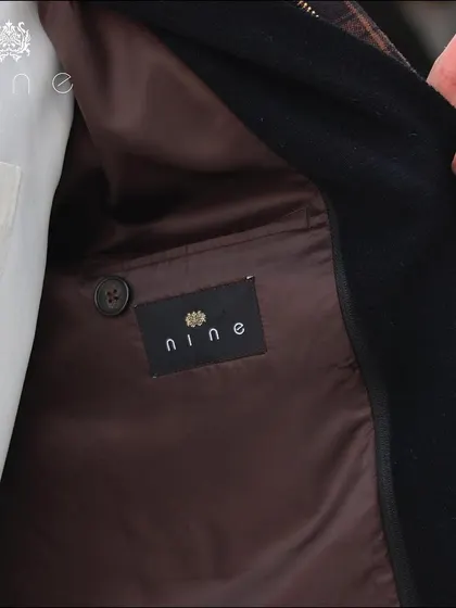 A look inside one of our jackets. The quality of the lining and the clean internal stitching are just as important as the exterior for ensuring comfort and durability.