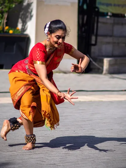 A graceful pose from the ANHAD festival, where the shadows on the pavement become part of the dance.