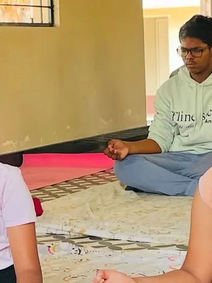 Children meditating peacefully during the sound bath.