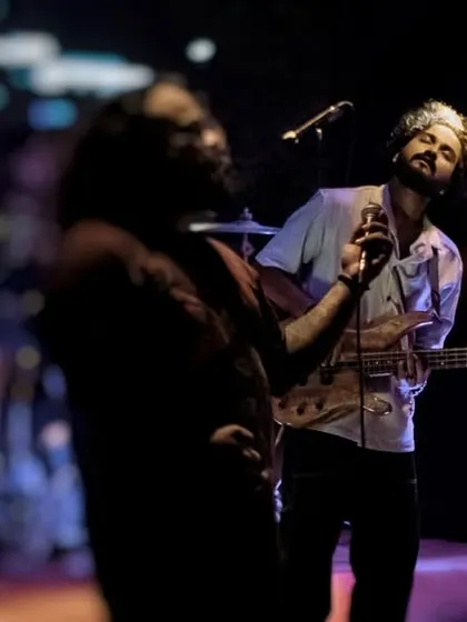 A moment of connection between our bassist and frontman on stage. Our chemistry as a band translates into a tight, powerful performance every time.