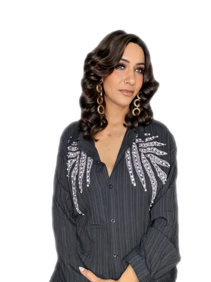 A beautifully styled client, showcasing the kind of polished, elegant looks we create.