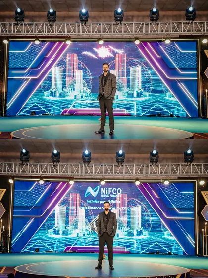 Commanding the stage at the 10th-anniversary celebration for NIFCO. A powerful stage presence is key to holding the audience's attention and ensuring a seamless event flow, no matter the scale.