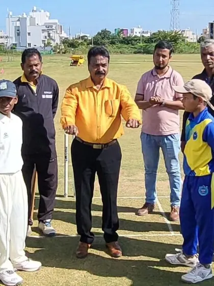 The coin toss ceremony with umpires and captains before a match in Hubli.