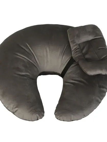 A grey nursing and feeding pillow for mothers, shot on a white background.
