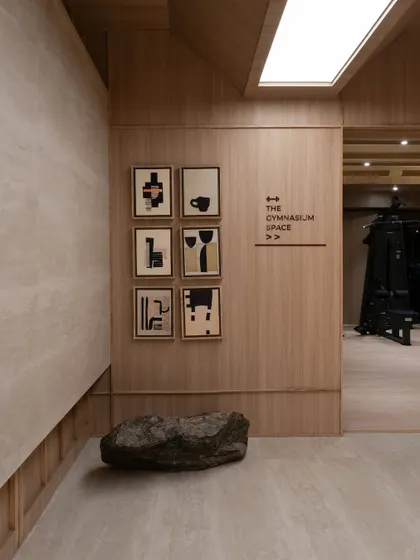 Further images from the BeWell, QBF Coffee, and Tubu projects, illustrating the consistent use of natural materials, clean lines, and thoughtful lighting to create serene and restorative commercial spaces.