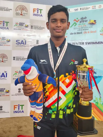 Renukacharya Hodmani with his gold medal from the 10Km event at the Khelo India Beach Games.
