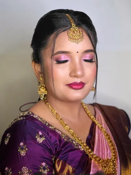 The eyes are closed here, showing the beautiful blend of the pink eyeshadow.